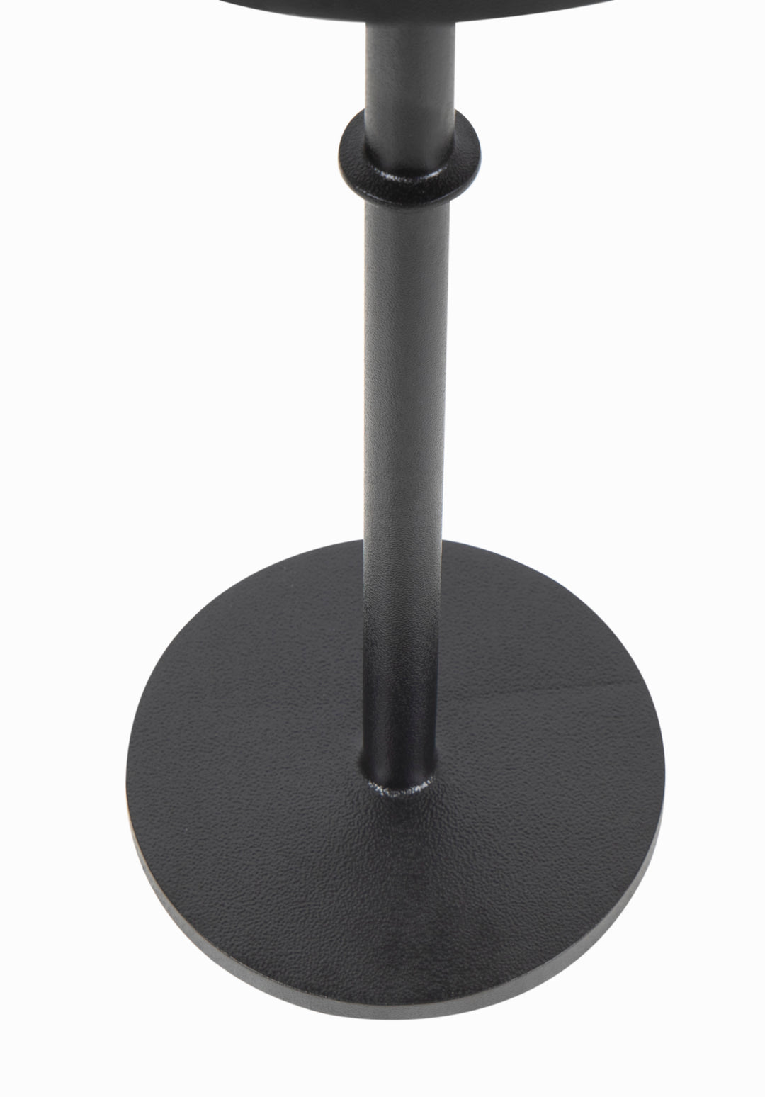 Black cast iron sturdy metal base in white background.