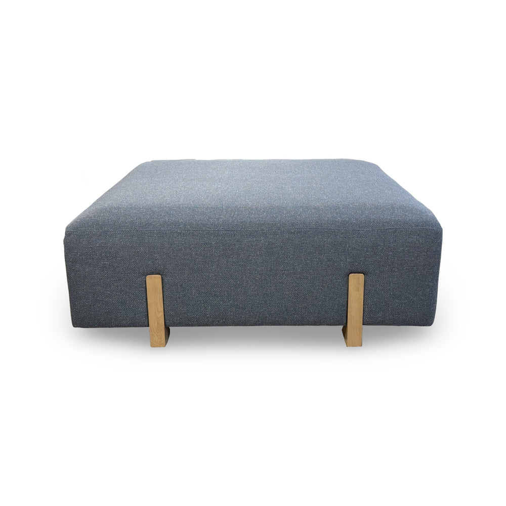 Blue Sonoma Cocktail Ottoman seen from the front on a white background