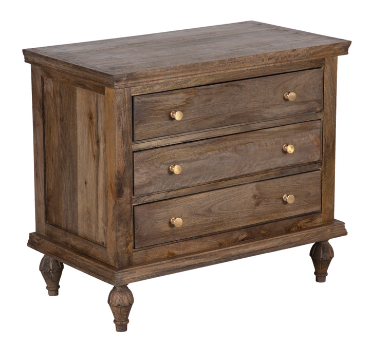 Brown wooden nightstand with three drawers and golden hardware on an angle on a white background