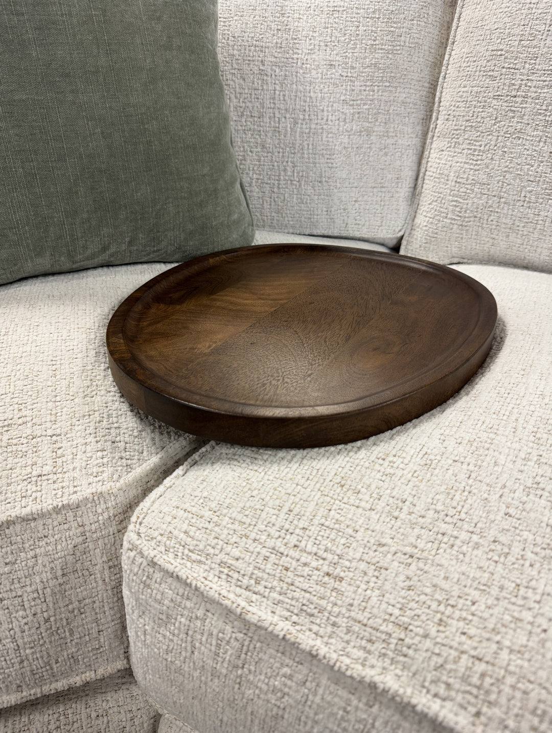 The top of Brown Sadie Sofa Table on a sofa